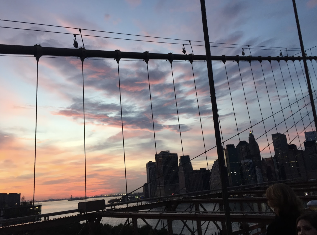 Sunset while walking across the Brooklyn Bridge