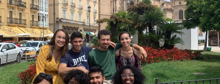 a group of students posing in front of a building in Alicante