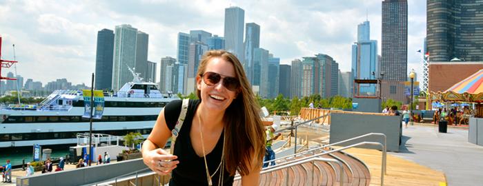 Student in front of Chicago skyline